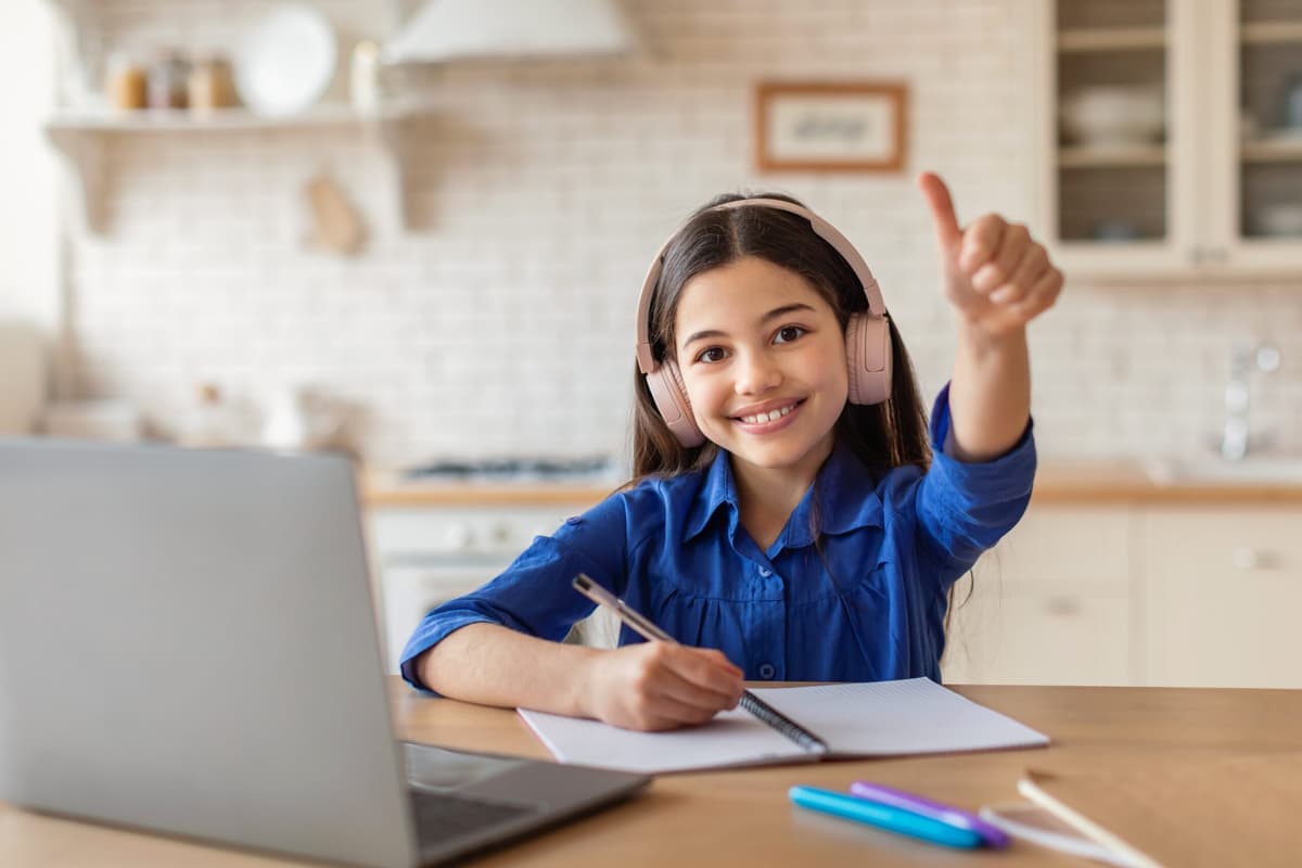 Smiling student studying ISEE Vocabulary vocabulary for ISEE exam preparation